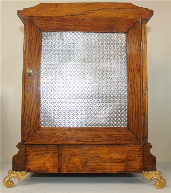 A late Victorian golden oak bracket clock, 13in.